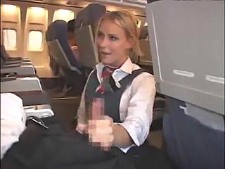 Blond girl gives head in a plane