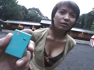 Mature asian chick gives BJ in public